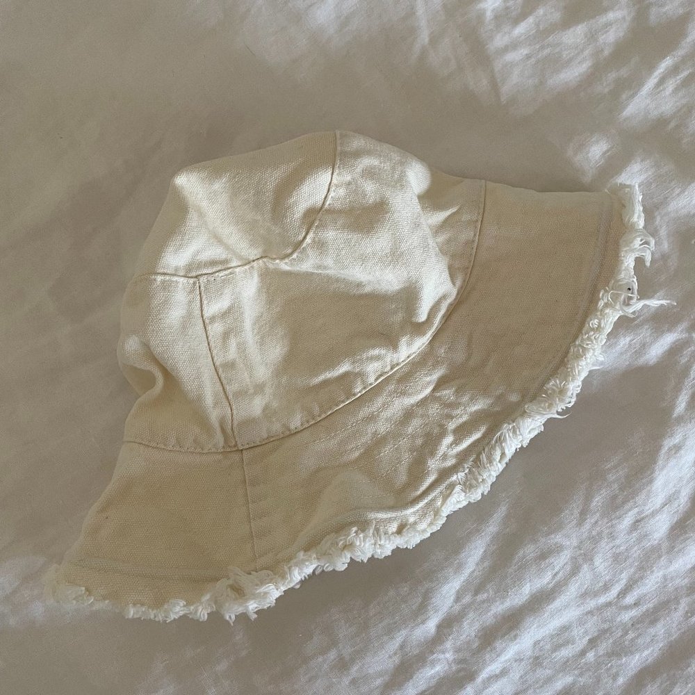 Off-white cream fringed cotton bucket hat